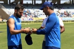 ms dhoni presented caps, lt col ms dhoni caps., india vs australia team india wear army caps as a mark of respect, Army caps
