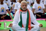 Amit Shah, Narendra Modi, narendra modi leads international yoga day in lucknow, Guinness world record