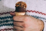 sweets when in stress, ice cream for anxiety, reasons why we reach for ice creams or sweets when stressed, Handbag